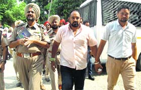 Jagdish Bhola comes out of the court after a hearing in Kapurthala on Wednesday