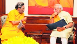 Prime Minister Narendra Modi at a meeting with Shantikunj head Dr Pranav Pandya in New Delhi on Wednesday. A Tribune photograph