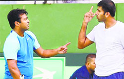 Leander Paes and Rohan Bopanna will have to win the doubles tie to give India a chance to upset Serbia. PTI