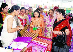 Participants at an exhibition held by the Department of Life Long Learning at GNDU in Amritsar on Friday.