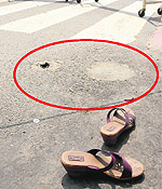 The spot where the victim, Meena, fell after jumping from the fifth floor of the PGIMER in Chandigarh on Friday