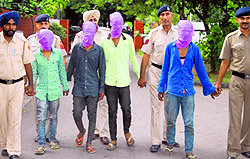The accused in police custody at the Sector 11 police station in Chandigarh on Friday