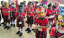 Students enjoy during the animal mask party at Tribune Model School, Sector 29, Chandigarh, on Friday