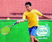 Calvin Golmei returns a shot during a tennis match in Chandigarh on Friday