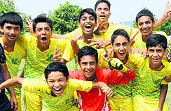 The winning team in a jubilant mood