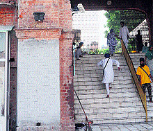 A view of the newly cemented portion of Maharaja Sher Singh Gate where a plaque was installed earlier at Golden Temple in Amritsar