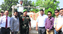 The Maha Mai Mansa Devi Charitable Bhandara Committee members donate relief material to the Station Commander, Chandimandir, in Panchkula. A Tribune photograph