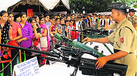For self-defence: Students have a look at weapons on exhibition by the BSF at KMV College in Jalandhar on Saturday.