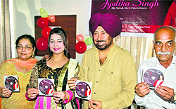 Singer Jyotika Singh (second from left) and comedian Jaswinder Bhalla (on her left) during the release of her music album Shades of love
