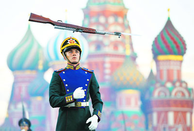 A member of the Band of the Moscow Suvorov Military Music College from Russia performs during the International Military Music Festival “Spasskaya Tower” in front of the St. Basil’s Cathedral in Red Square in Moscow. Military bands from different countries took part in the tattoo.