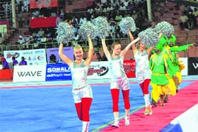 Cheerleaders perform during the inaugural ceremony of the World Kabaddi League in Bathinda