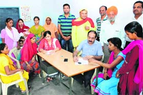 Patients being examined by doctors during an ayurvedic medical camp at Janta Nagar in Bathinda on Sunday