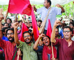 Winning candidates of AISA (L to R) president Ashutosh Kumar, vice-president Anant Prakash Narayan, general secretary Chintu Kumari and joint secretary Shafqat Hussain Butt celebrate on JNU campus in New Delhi on Sunday.