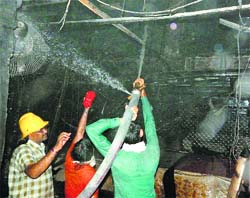 Firemen in action in Rewari on Sunday.