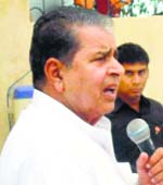 BJP candidate Jagdish Nehra addresses a meeting in the Rania Assembly segment on Sunday.