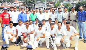 Participants of the Chamba Dasehra Cricket Tournament with SP DK Chaudhary and Major SC Nayyar at Chamba on Sunday.