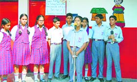 Students participate in save electricity campaign at Nurpur.