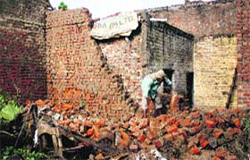 The collapsed wall in the Jagat Pura area in Jalandhar on Sunday