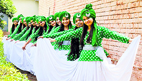 Students pose before their performance at the Hindi Diwas celebrations organised by Punjab Hindi Parishad at SCD Government College in Ludhiana on Sunday.