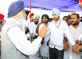 Chief Minister Parkash Singh Badal interacts with rain-affected people of Muktsar on Sunday