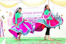 Girls perform a Rajasthani folk dance at Law College in Dehradun on Sunday. 