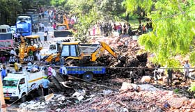 A demolition drive under way near Punjab Engineering College in Chandigarh on Monday