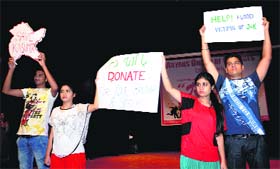 Students of the Aryans Group of Colleges at a fund-raising event during the annual cultural extravaganza at Tagore Theatre in Chandigarh on Monday