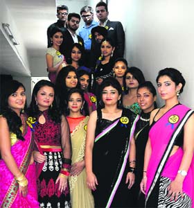 Participants of Mr and Ms Fresher contest pose for a photograph during a freshers' party at GGDSD College in Chandigarh on Monday