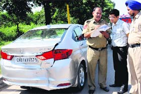 The Zirakpur resident, whose car was hit by an escort vehicle, narrates the incident to policemen