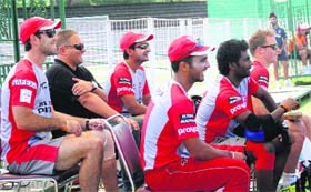Players of Kings XI Punjab watch a practice match in Chandigarh on Monday
