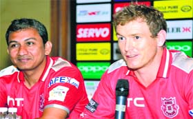 Coach Sanjay Bangar and captain George Bailey address mediapersons in Chandigarh on Monday