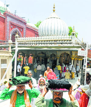 Sufi shrines in India are the greatest inter-faith laboratories, and will remain the centre of Islamic practices in the country. Devotees at the Hazrat Nizamuddin Dargah, New Delhi. Tribune photo: Manas Ranjan Bhui