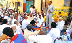 Villagers during a panchayat at Nangal Kalia village in Mahendragarh district on Monday. Photo: Sumit Tharan