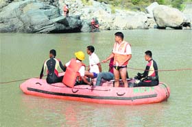 A file photo of a search operation for missing students after the tragedy in the Beas near Thalot in Mandi