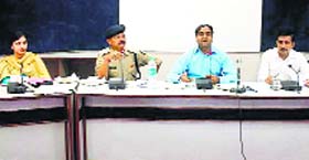 DC Abhishek Jain presides over a district-level meeting on efficiency in administration in Una on Monday