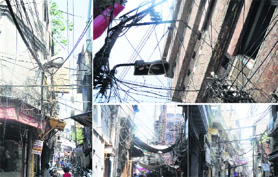 Wiring trouble: Overhead high-tension wires at Purana Bazar, Ludhiana, can reduce the market to ashes. Learning no lessons from the past, the authorities continue to look the other way, jeopardising the lives of area residents and shopkepers.