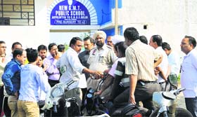 Office-bearers of the Parents Association protest outside New GMT Public School in Haibowal.