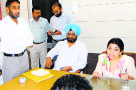 Congress MLA Kuljeet Singh Nagra and SDM Pooja Syal Grewal at Sirhind Municipal Council office on Monday.