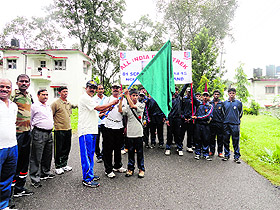 Maj Gen Kuldip Singh, Additional Director General of NCC, Uttarakhand, flags off a trek of NCC cadets in Dehradun on Monday. 