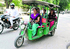  Sunita Devi rides an e-rickshaw in Haridwar on Monday. 