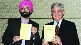 A former Chief of Army Staff, Gen VP Malik (right), and Major Navdeep Singh during the release of a book, Maimed by the system, in Panchkula on Tuesday.