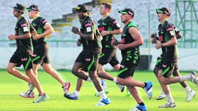 Players of Sunfoil Dolphins practise at the PCA Stadium in Mohali on Tuesday.