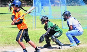 Players in action during the Inter-College Baseball Championship for Women at Panjab University.