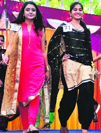 Girls walk down the ramp during the Miss Fresher contest at the Government College for Commerce and Business Administration, Sector 42, Chandigarh, on Tuesday.