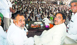 Ellenabad MLA Abhay Chautala with an INLD leader in Uchana Kalan on Tuesday.