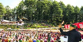 Chief Minister Virbhadra Singh addresses a public meeting at Nankhari in Rampur subdivision of Shimla district on Tuesday.
