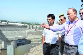 Union Home Secretary Anil Goswami inspects the 4th Tawi bridge which collapsed during the floods in Jammu