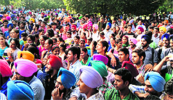 The students of Guru Nanak Dev Engineering College protest against the college authorities in Ludhiana on Tuesday