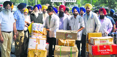 SGPC chief Avtar Singh Makkar with a medical team at the Amritsar airport on Tuesday. Tribune photograph