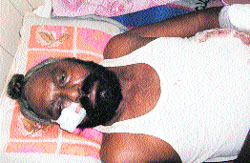 The injured ATM security guard Sukhwinder Singh at a private hospital in Amritsar on Wednesday.